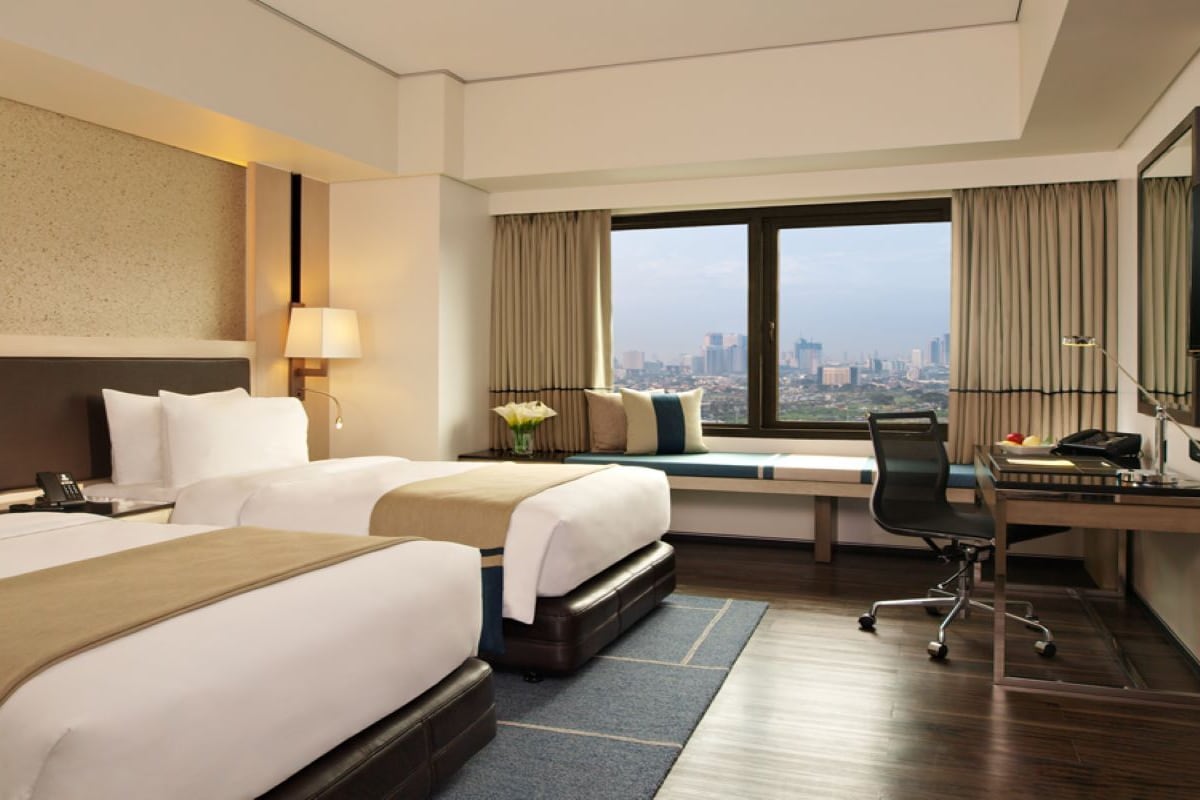 Luxe beddengoed, donsdekens, een minibar, een kluis op de kamer