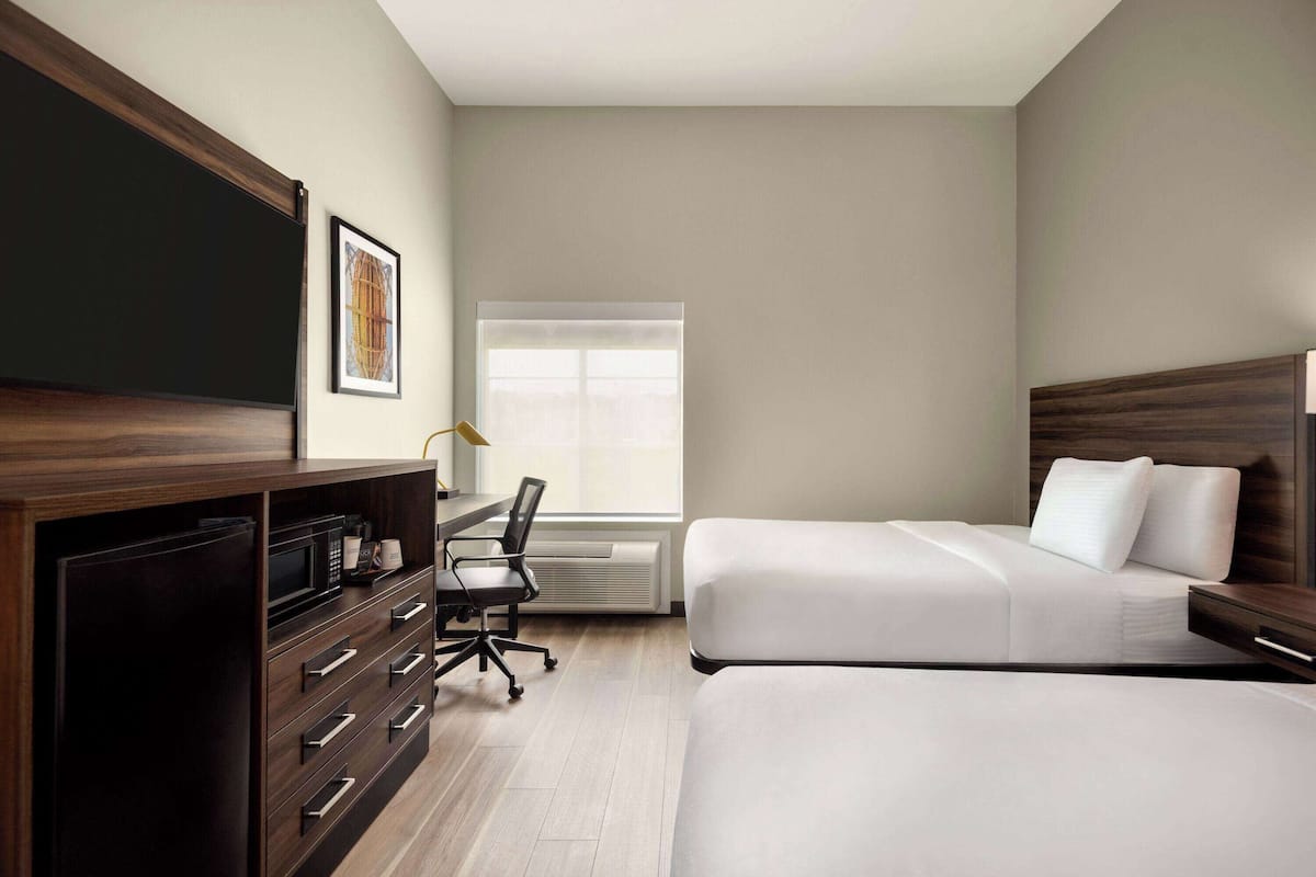 Premium bedding, pillow-top beds, desk, iron/ironing board