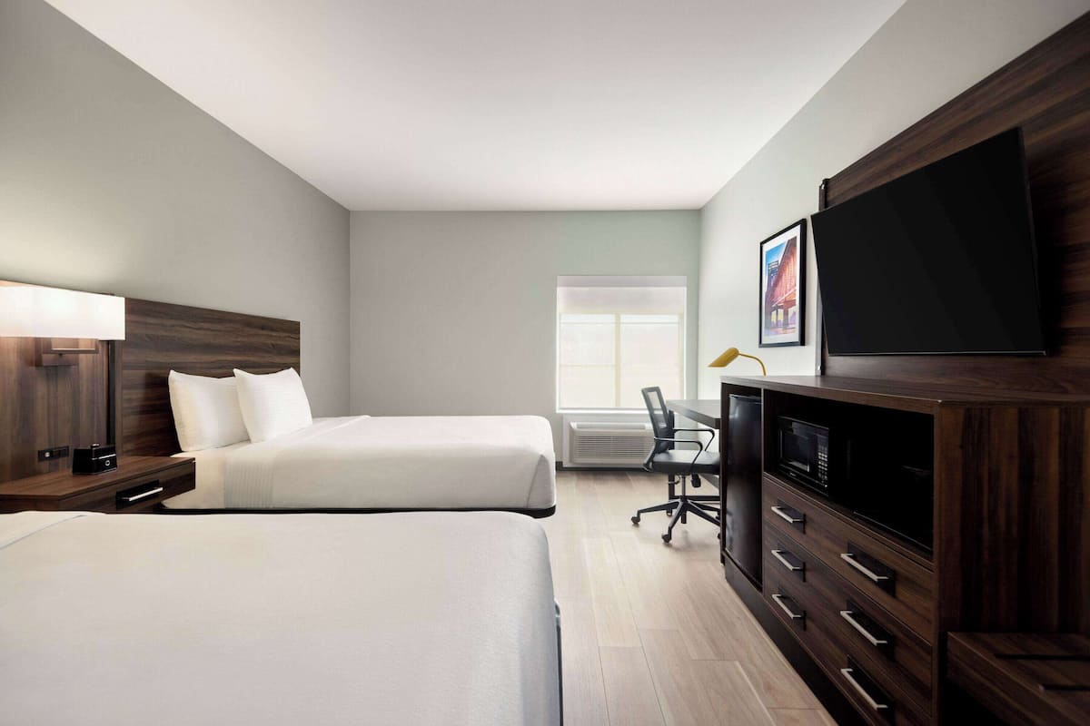 Premium bedding, pillow-top beds, desk, iron/ironing board