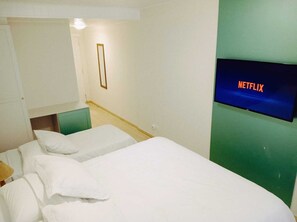 Superior Triple Room | Premium bedding, minibar, free WiFi, bed sheets - Pousada Morro do Elefante (Campos do Jordão)