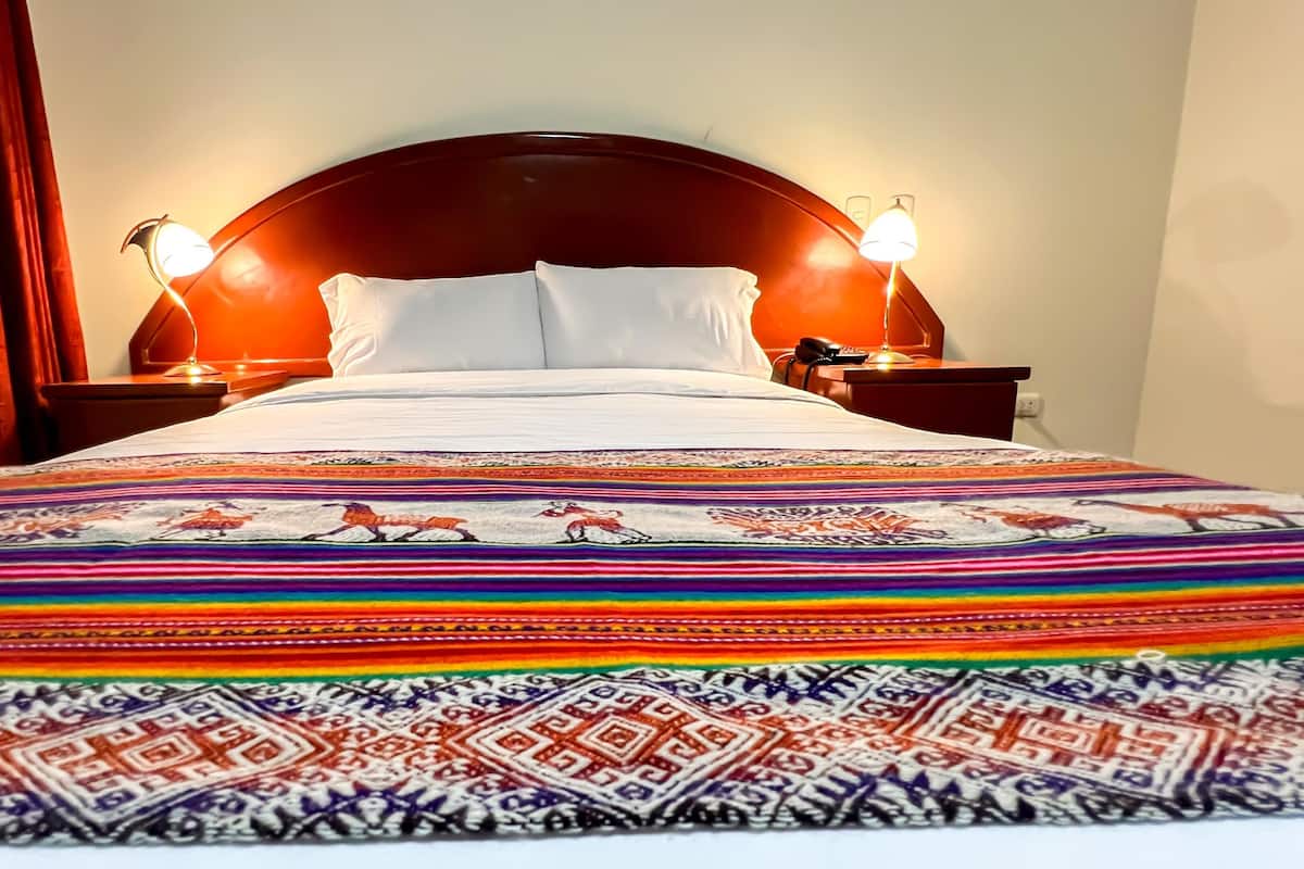 Down duvets, pillow-top beds, in-room safe, desk