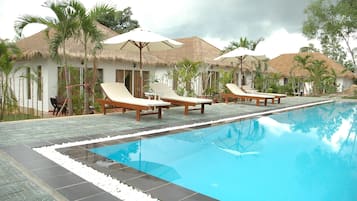 Outdoor pool, pool umbrellas, pool loungers