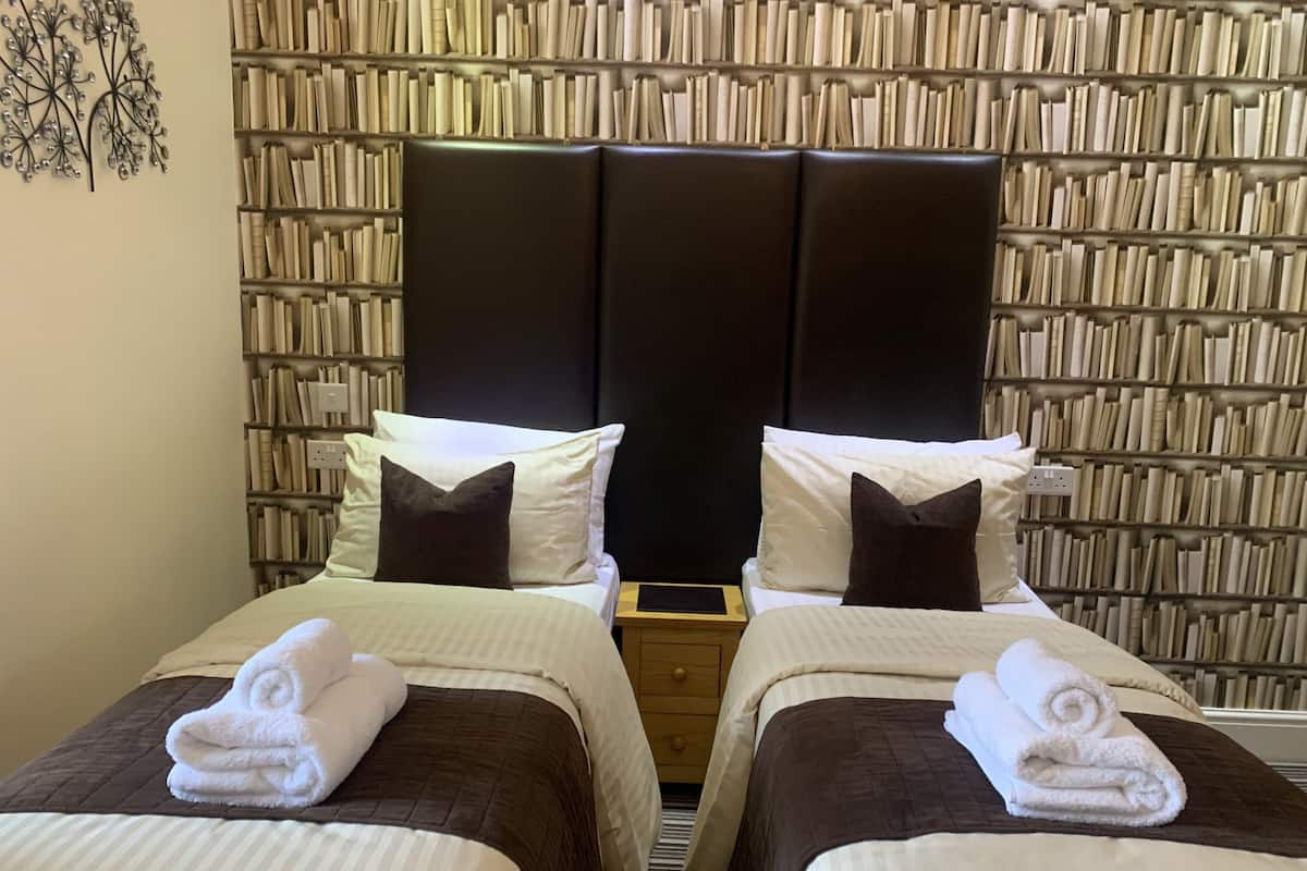 Superior kamer, 1 twee- of 2 eenpersoonsbedden, patio, op benedenverdieping | Een strijkplank/strijkijzer, gratis wifi, beddengoed