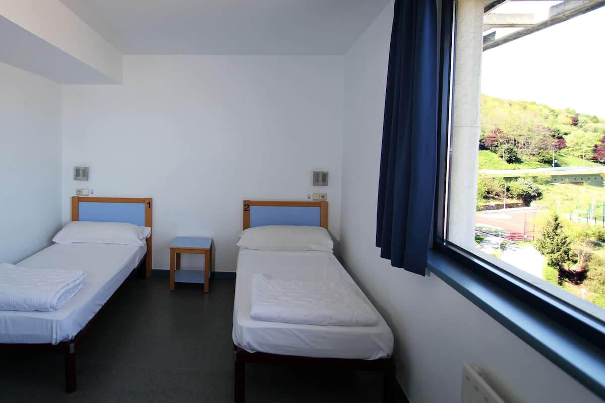 Double Room, Shared Bathroom | Blackout curtains, iron/ironing board, free WiFi, bed sheets