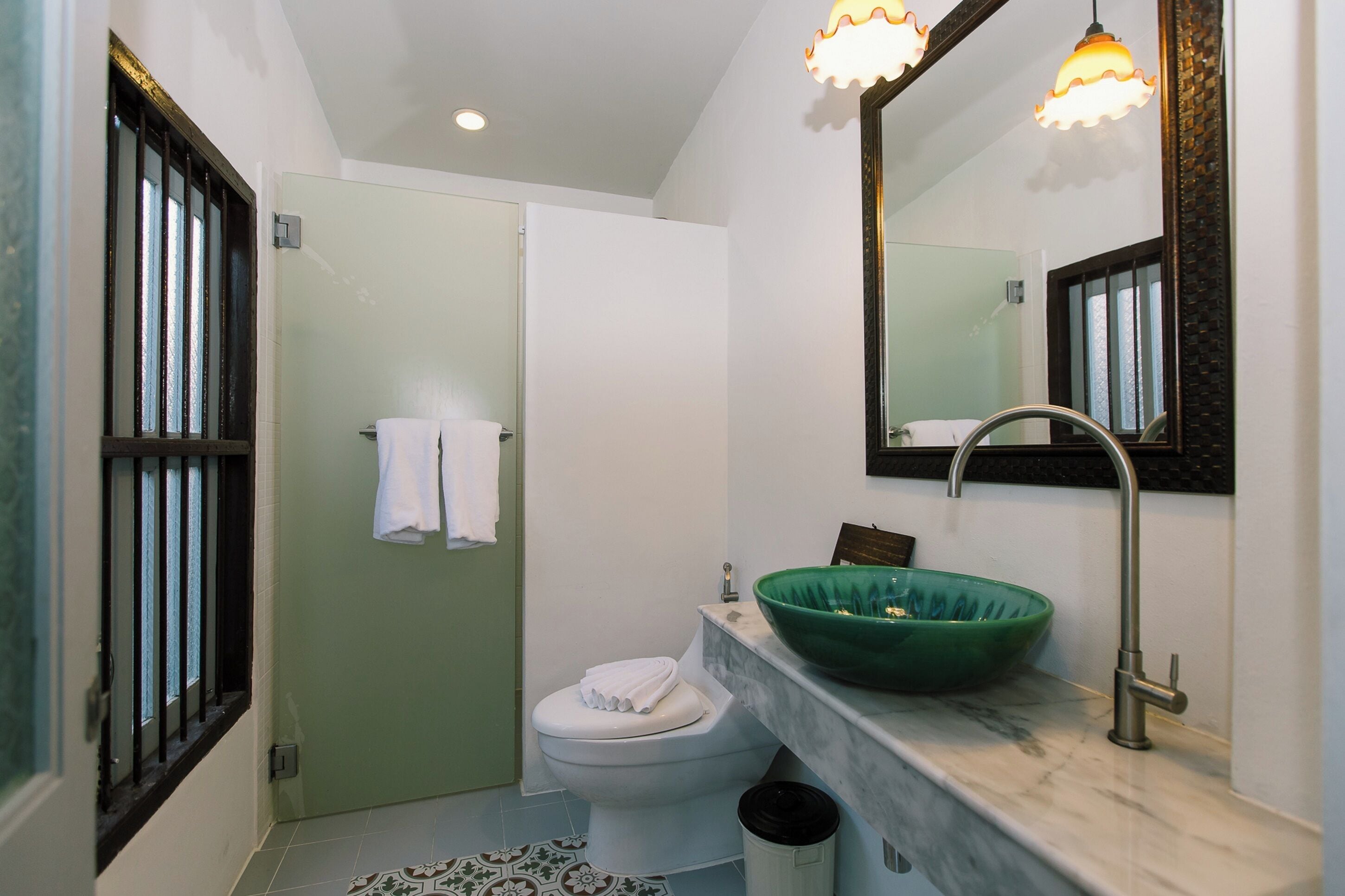 superior room | bathroom | shower, rainfall showerhead, free toiletries, hair dryer