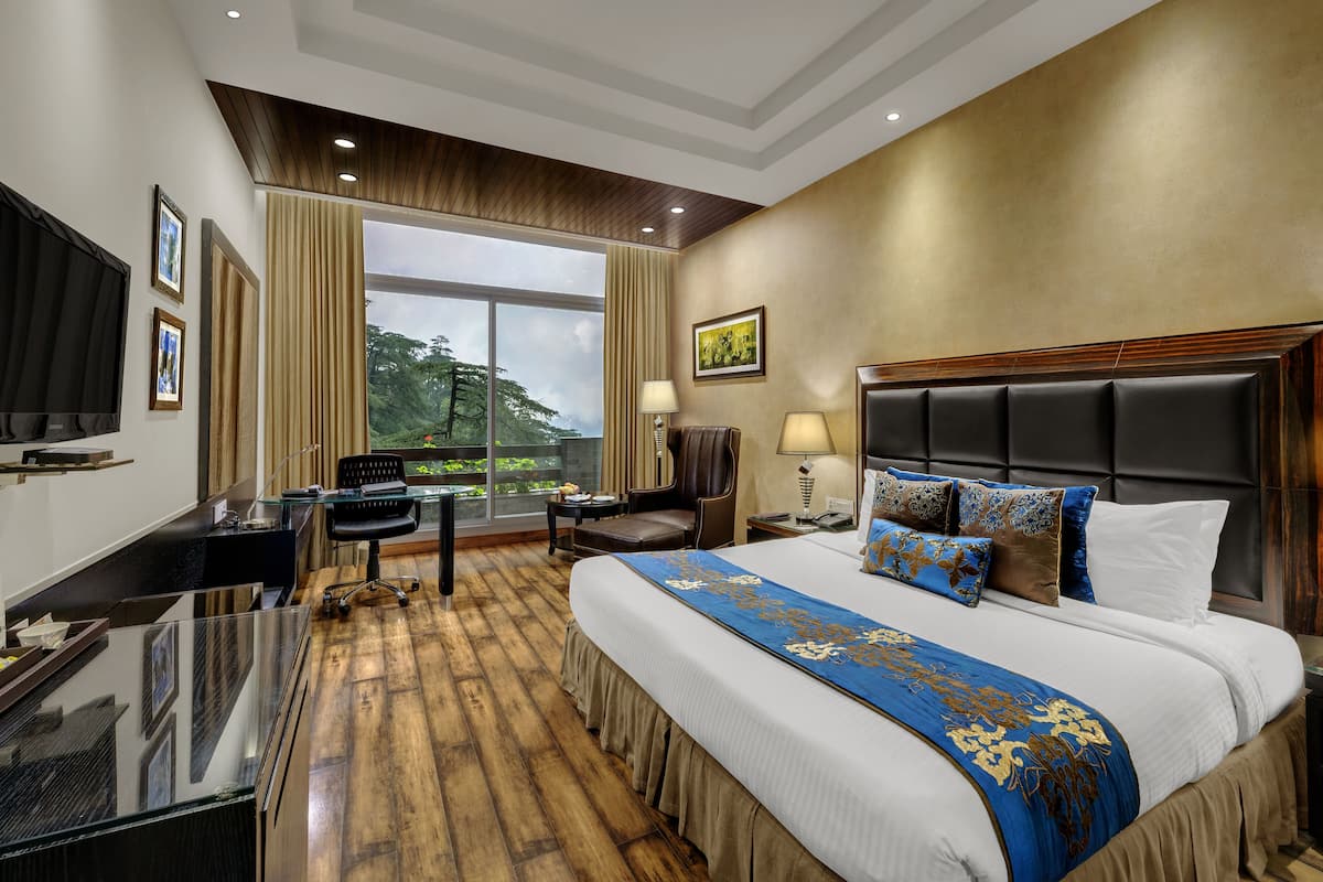 superior room | minibar, in-room safe, blackout curtains, iron/ironing board