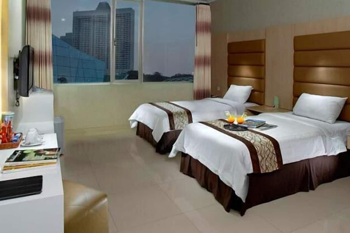 Suíte executiva, 1 cama King | Frigobar, cofres nos quartos, Wi-Fi de cortesia