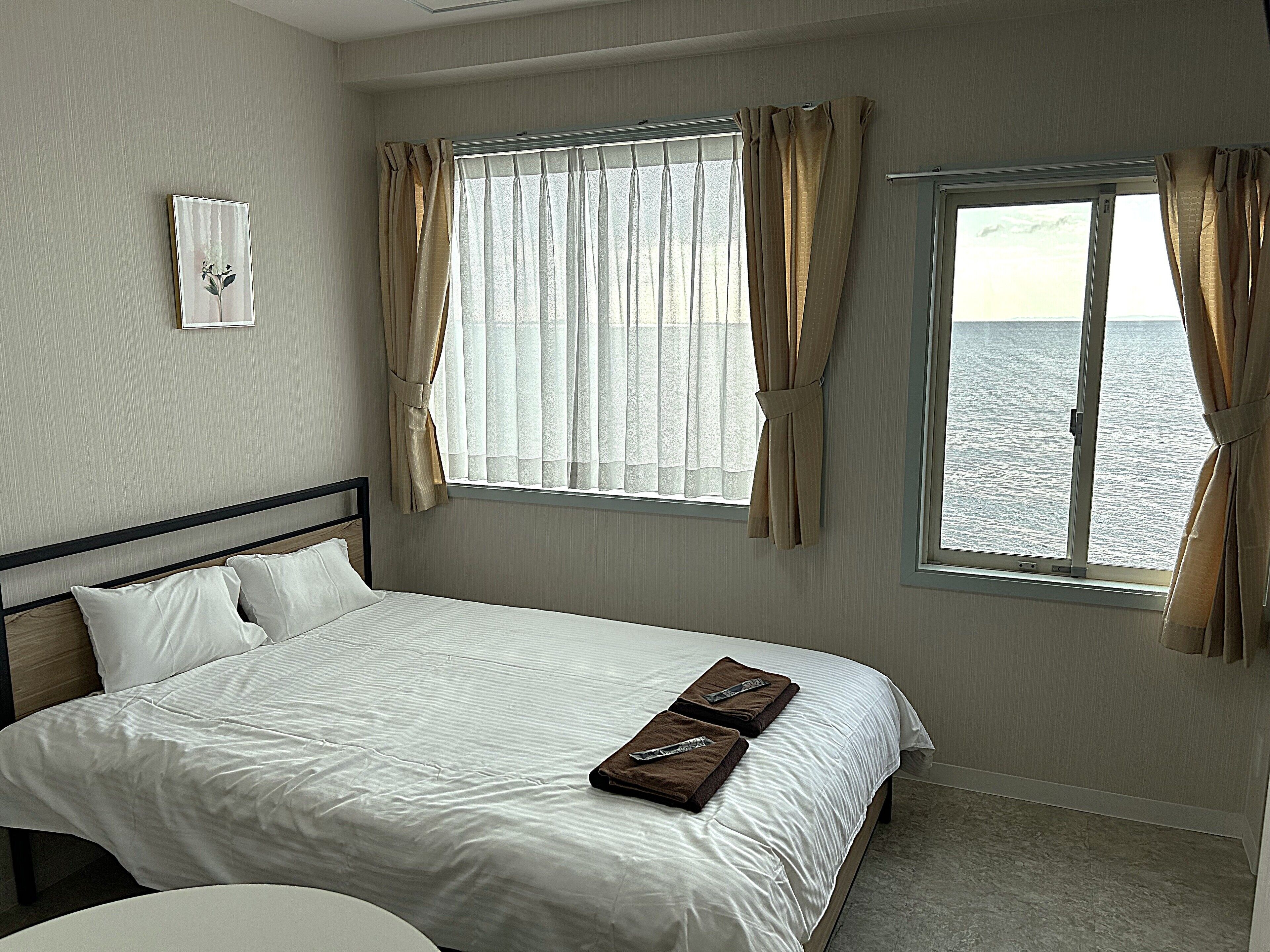 베이직 더블룸, 침실 1개, 금연, 바다 전망 | 다리미/다리미판, 무료 WiFi, 침대 시트