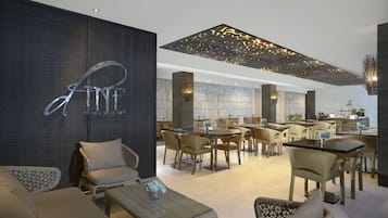 Breakfast, lunch, dinner served; international cuisine, pool views