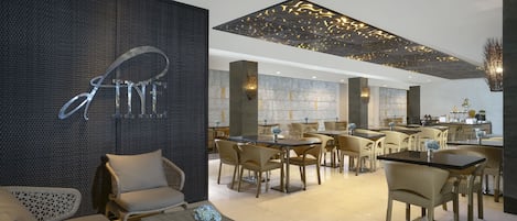 Breakfast, lunch, dinner served; international cuisine, pool views