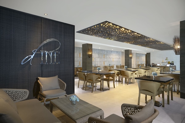 Breakfast, lunch, dinner served; international cuisine, pool views
