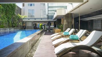 Outdoor pool, sun loungers