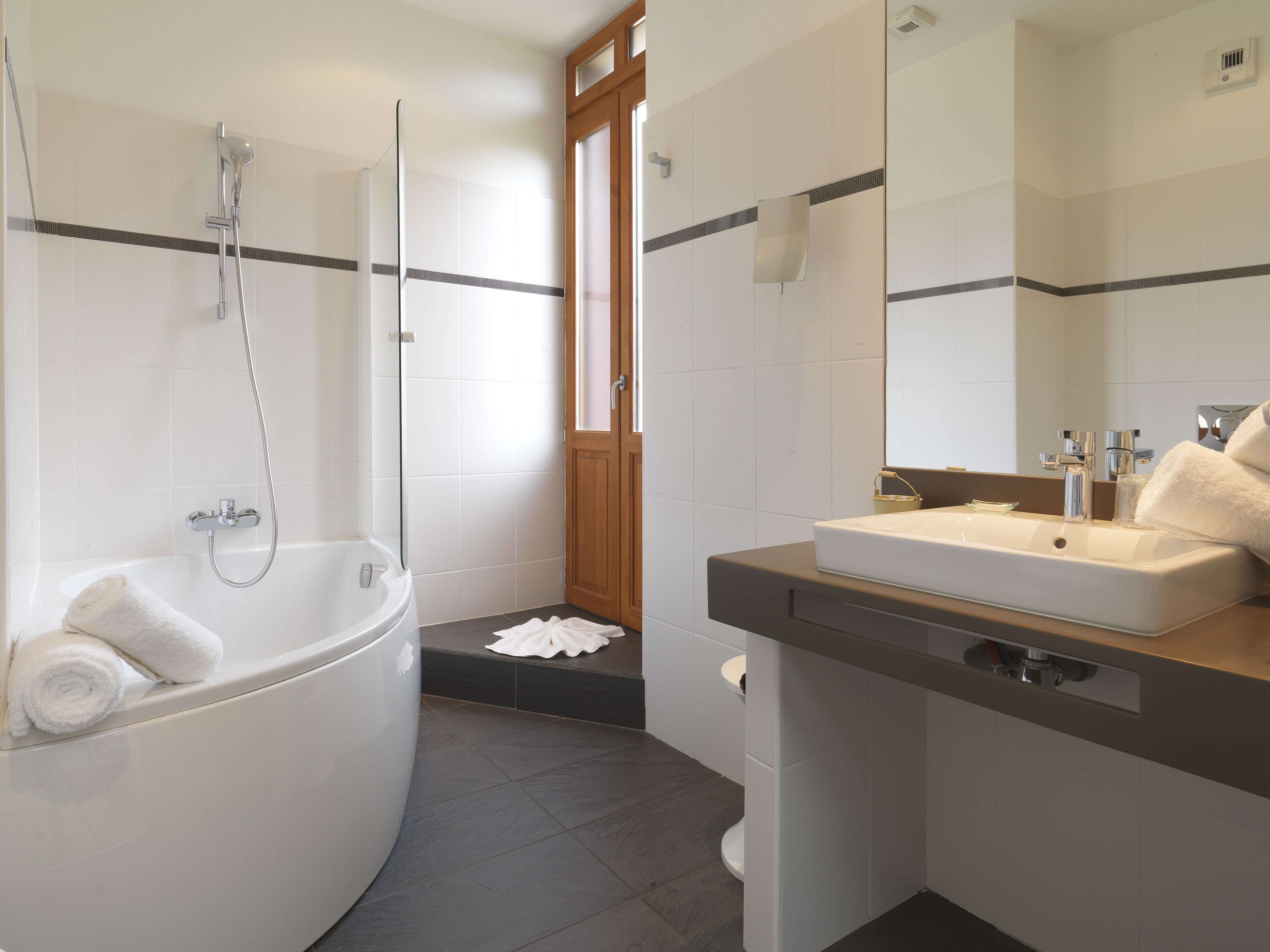 superior double room | bathroom | free toiletries, hair dryer, towels