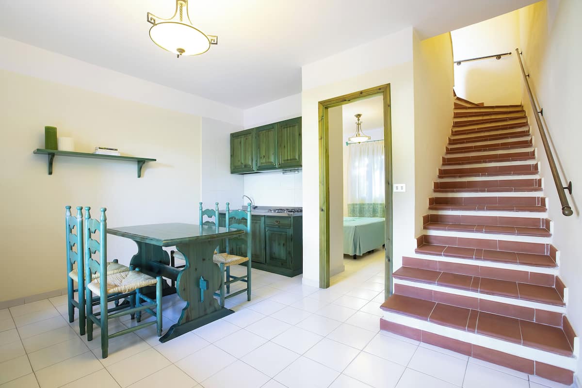 Two-Bedroom Apartment | In-room safe, desk, bed sheets