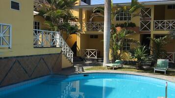 Outdoor pool, open 9 AM to 7 PM, sun loungers