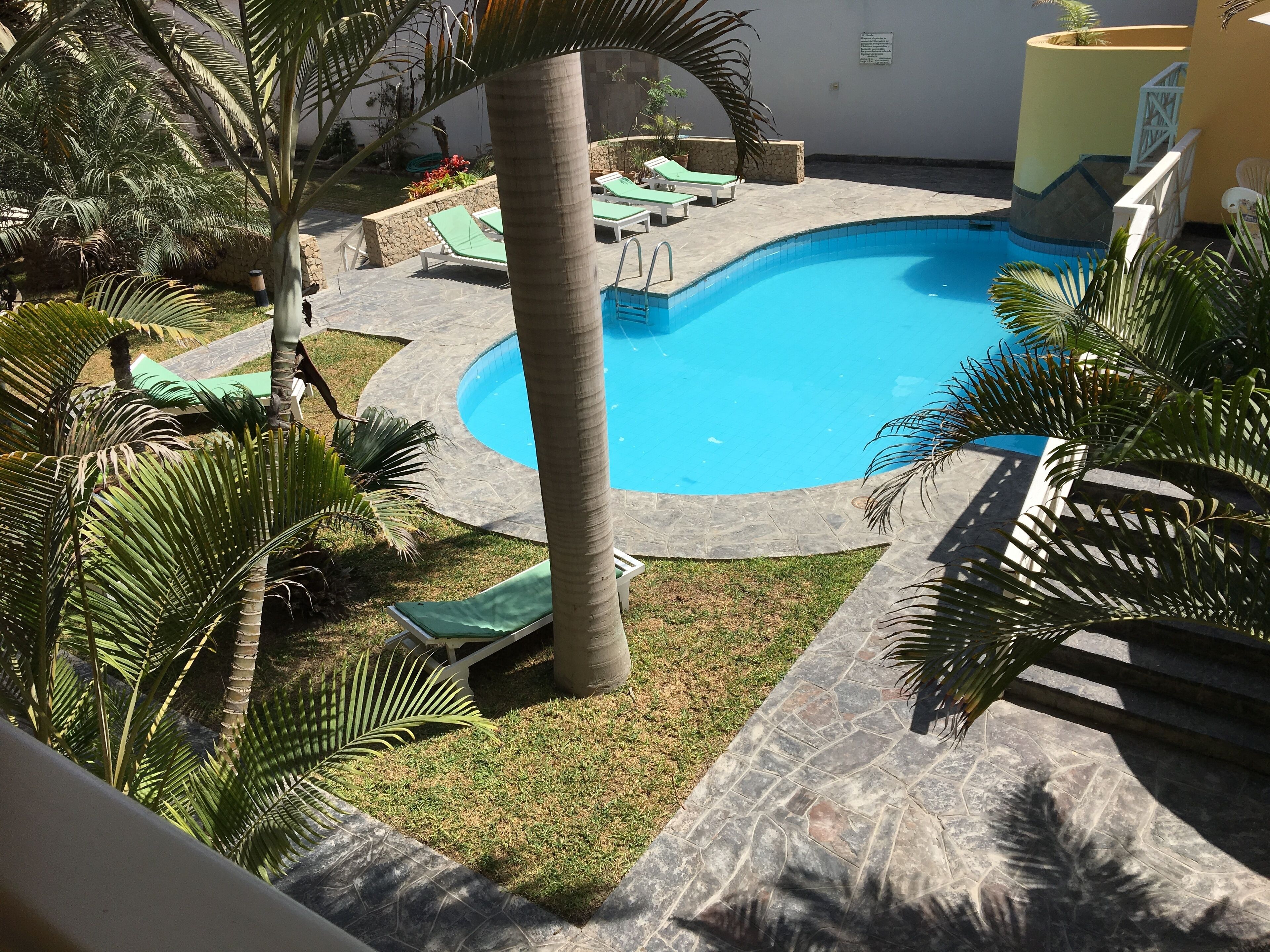 outdoor pool, open 9 am to 7 pm, pool loungers