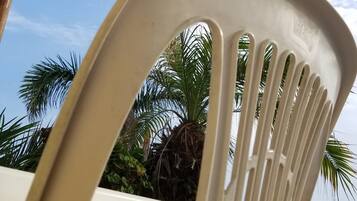 Habitación superior con 1 cama matrimonial o 2 individuales, Terraza, vista a la playa | Caja de seguridad en la habitación, wifi gratis y ropa de cama