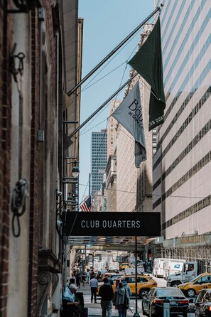 A street view with a Club Quarters sign, indicating a hotel. - Club Quarters Hotel, Grand Central (New York)