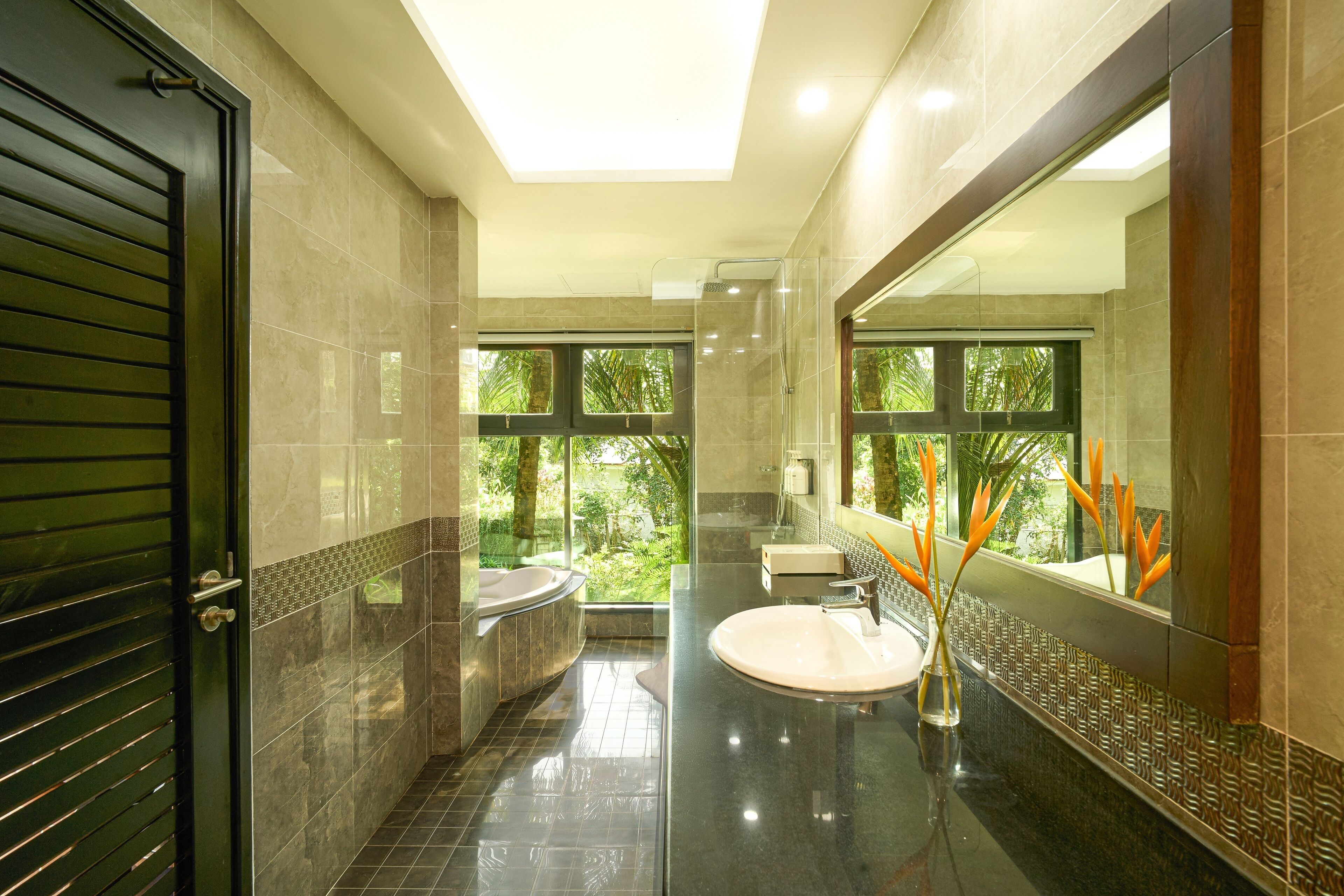 separate bathtub and shower, free toiletries, bathrobes, slippers