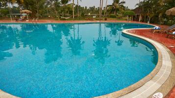 Outdoor pool, pool umbrellas, sun loungers