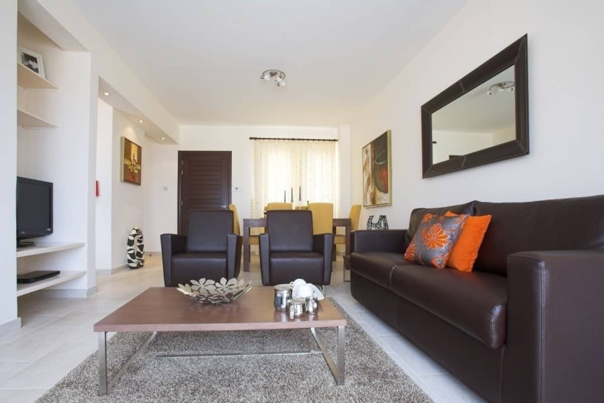 Condo, 2 Bedrooms | Living room | Flat-screen TV, DVD player