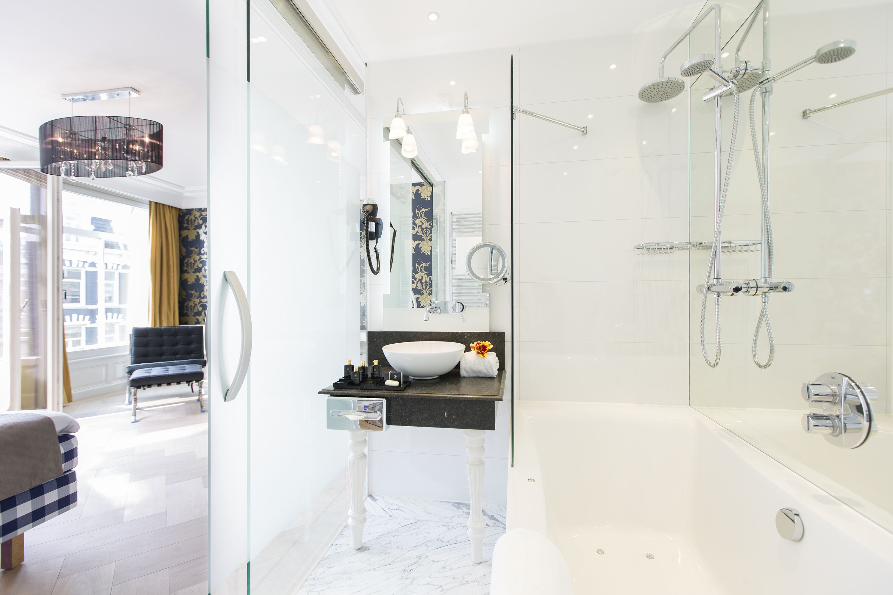 studio suite | bathroom | shower, rainfall showerhead, free toiletries, hair dryer