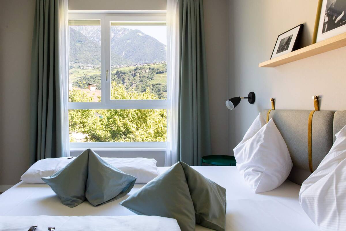 Suite, Balcony, City View (City) | Minibar, in-room safe, desk, laptop workspace