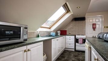 Departamento, 1 habitación, baño en la habitación (1st Floor) | Cocineta privada | Cafetera y tetera