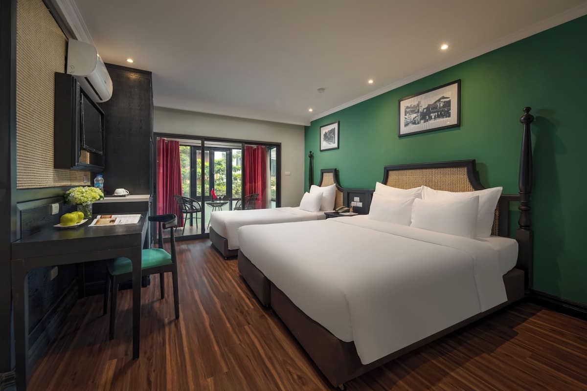 Family Room, Balcony, City View | Minibar, desk, free WiFi, bed sheets