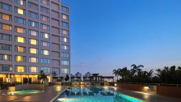 Outdoor pool, open 6:30 AM to 9:00 PM, free pool cabanas, pool umbrellas