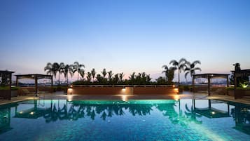 Outdoor pool, open 6:30 AM to 9:00 PM, free cabanas, pool umbrellas
