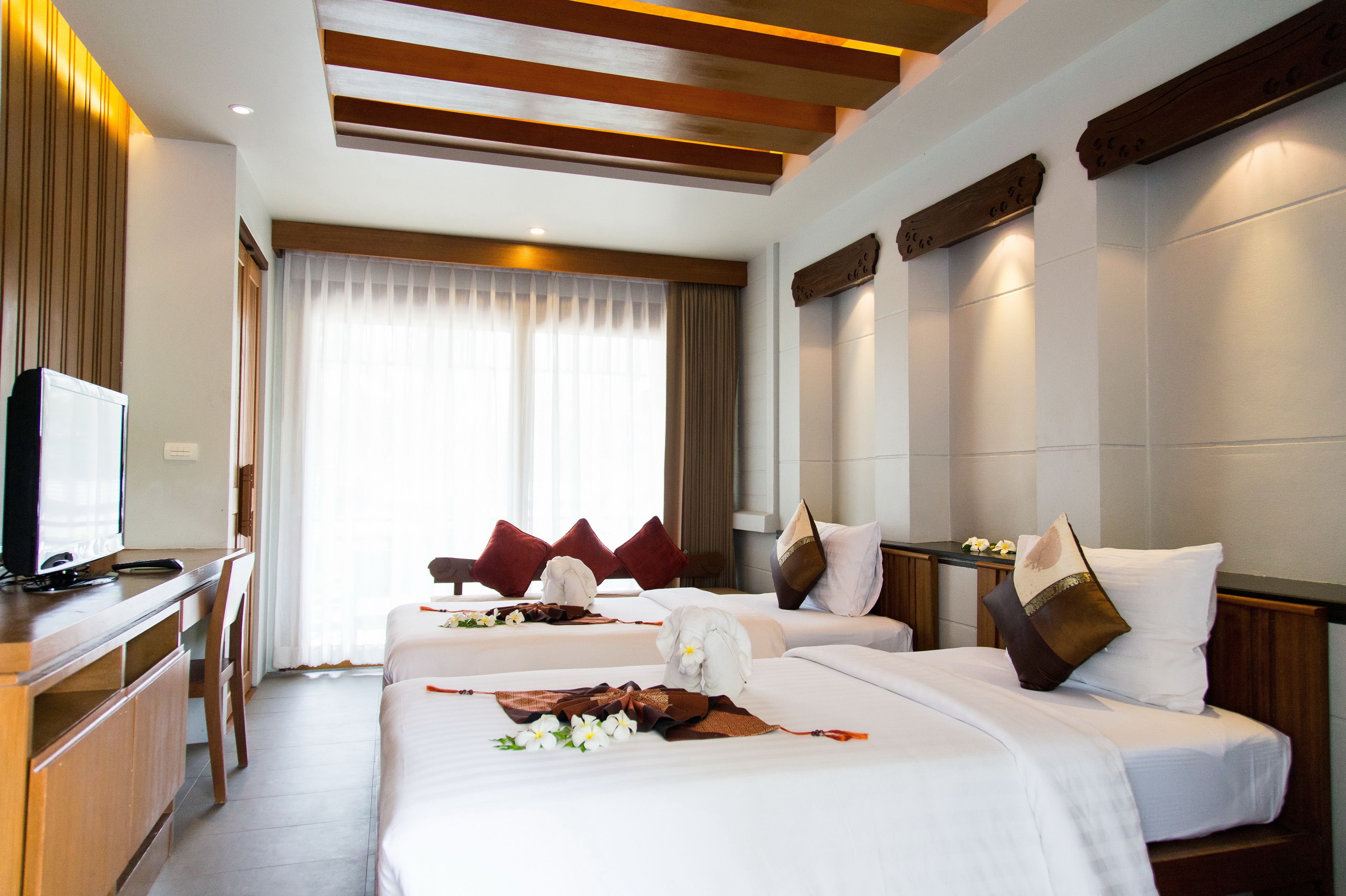 family room | 1 bedroom, minibar, in-room safe, desk