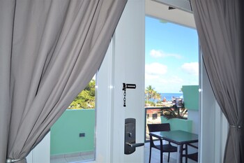 Panoramic Penthouse, 1 King Bed, Ocean View | 1 bedroom, in-room safe, individually decorated, individually furnished at Casa Verde Hotel - Steps to the Beach | Pool, Restaurant & Bar