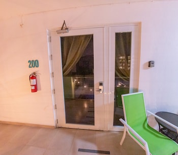 Standard Double Room | Living area | TV at Casa Verde Hotel - Steps to the Beach | Pool, Restaurant & Bar