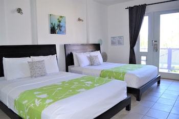 1 bedroom, in-room safe, individually decorated, individually furnished at Casa Verde Hotel - Steps to the Beach | Pool, Restaurant & Bar