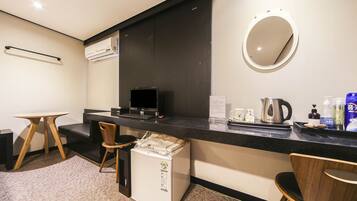 Premium bedding, down duvets, minibar, in-room safe