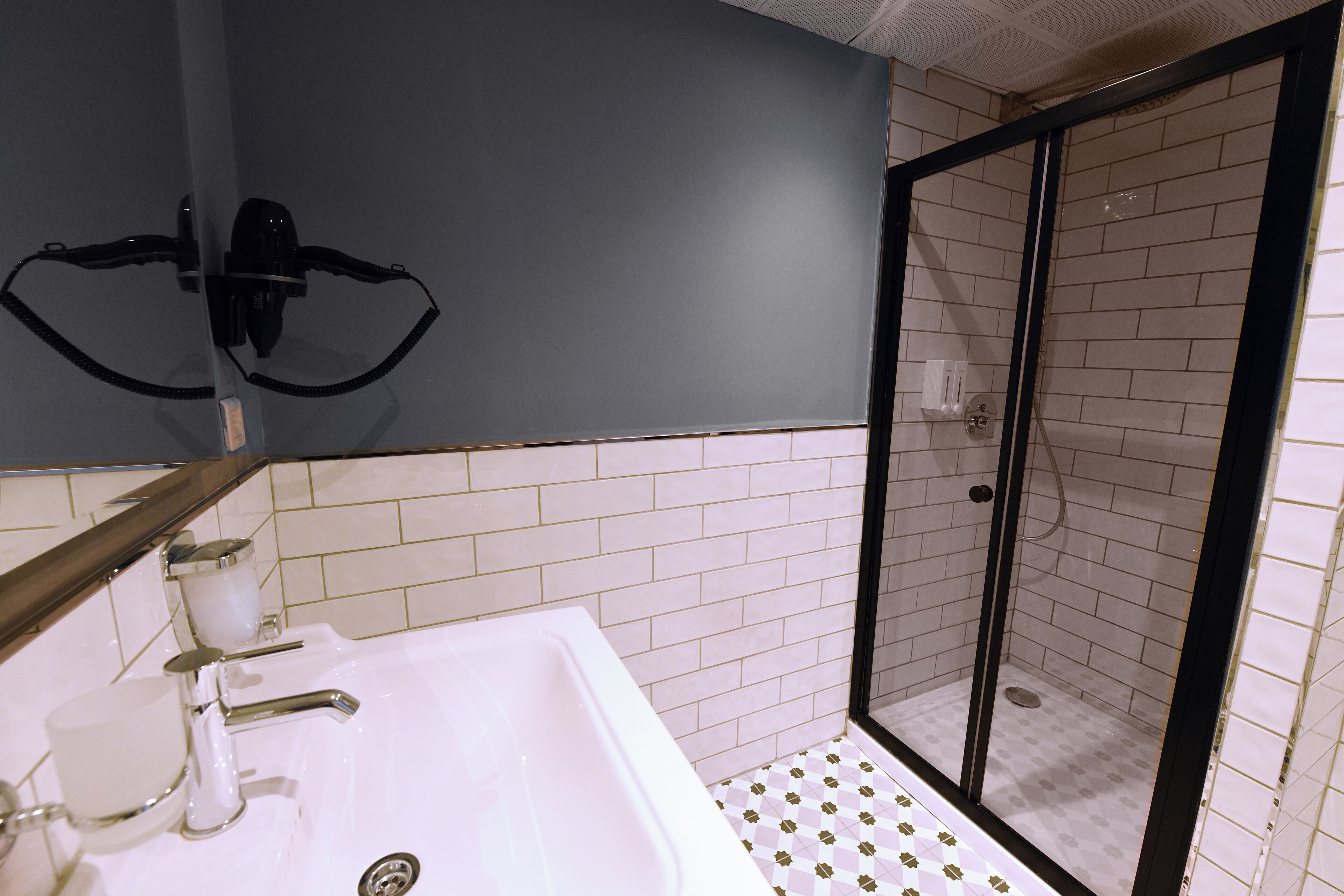 twin room | bathroom | shower, rainfall showerhead, designer toiletries, hair dryer