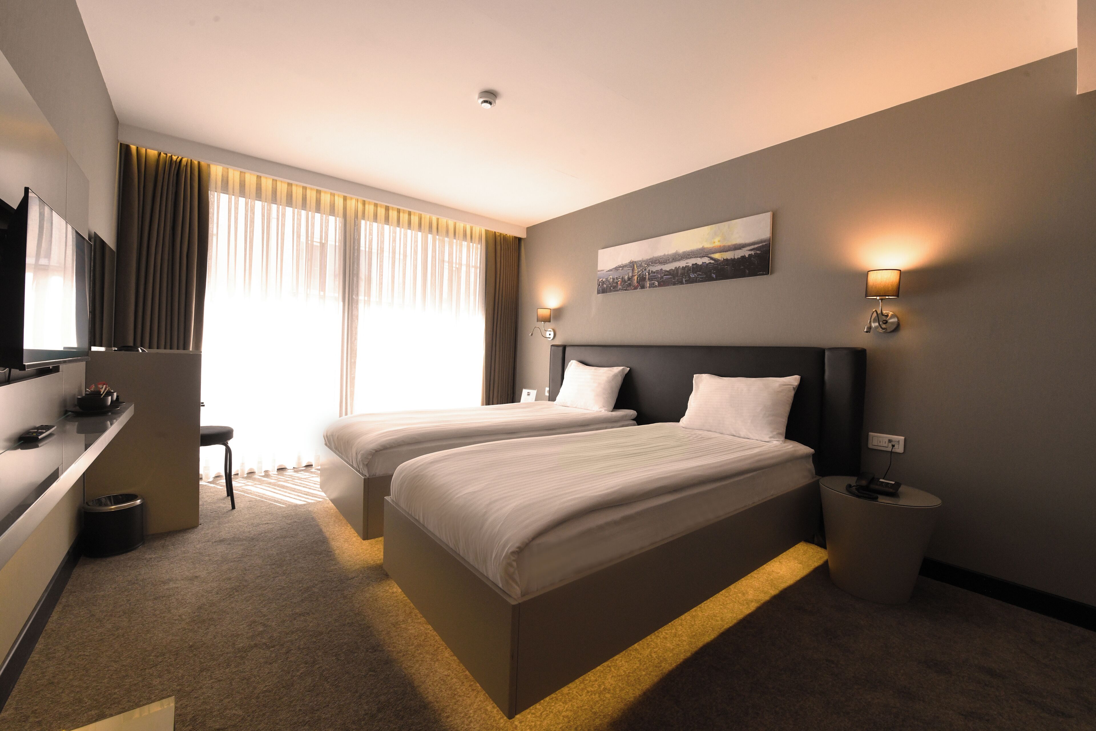 twin room | minibar, in-room safe, desk, laptop workspace