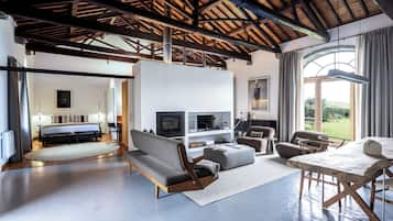 Design Loft | Living area | LCD TV, fireplace
