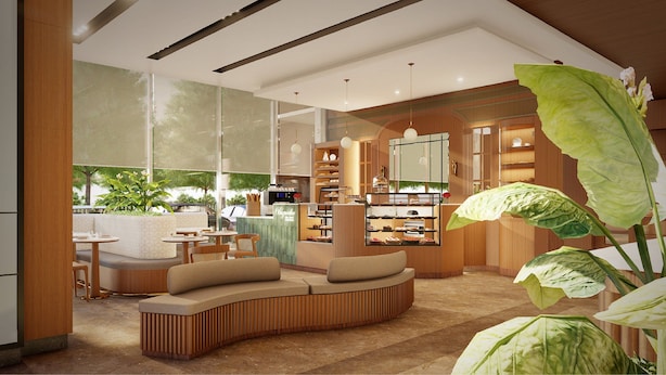 Een modern interieur met een zithoek, keuken en een eethoek.