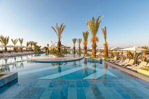 Indoor pool, 3 outdoor pools, open 9:00 AM to 6:30 PM, free pool cabanas