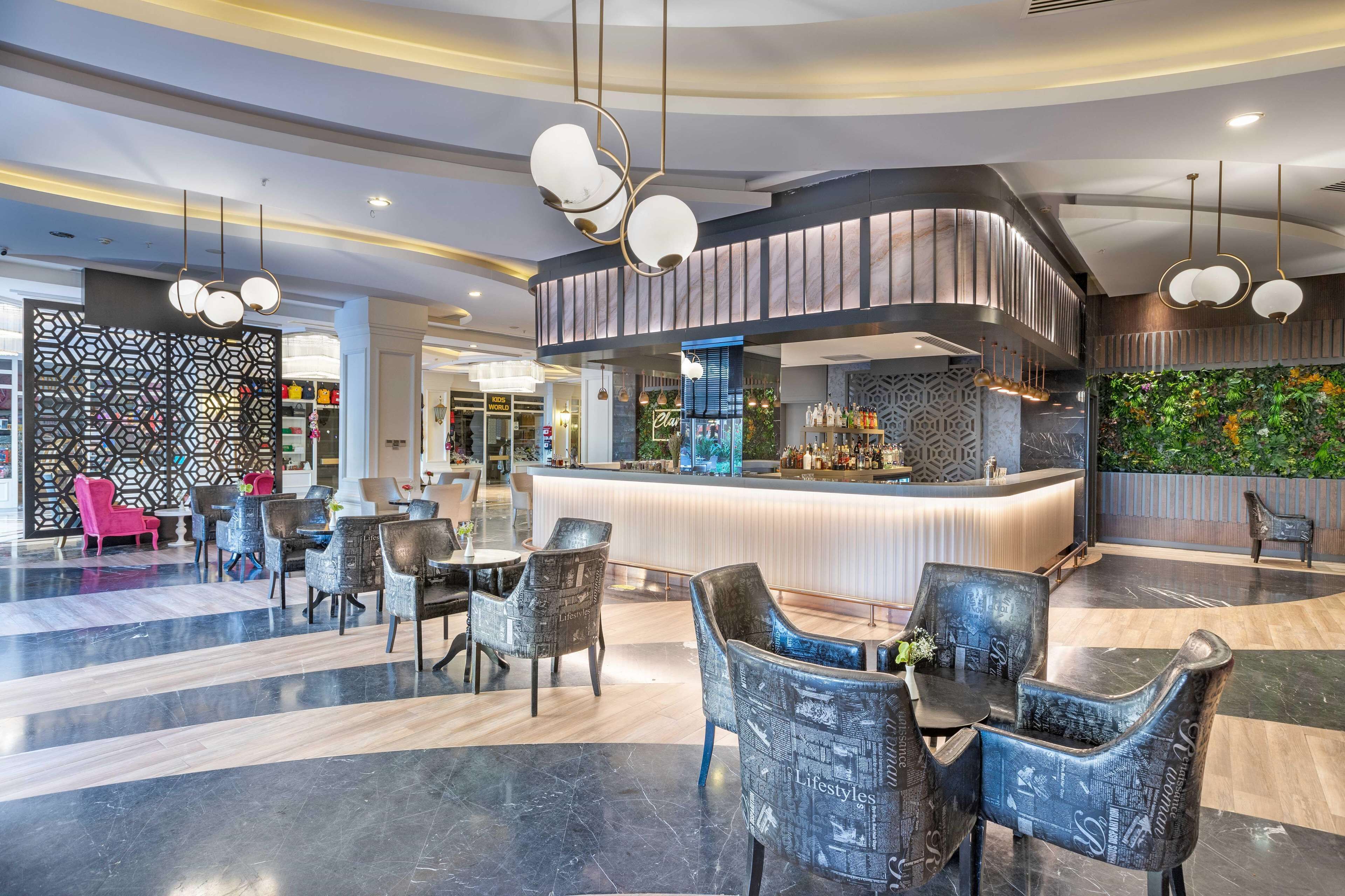 3 bars/lounges, poolside bar, beach bar