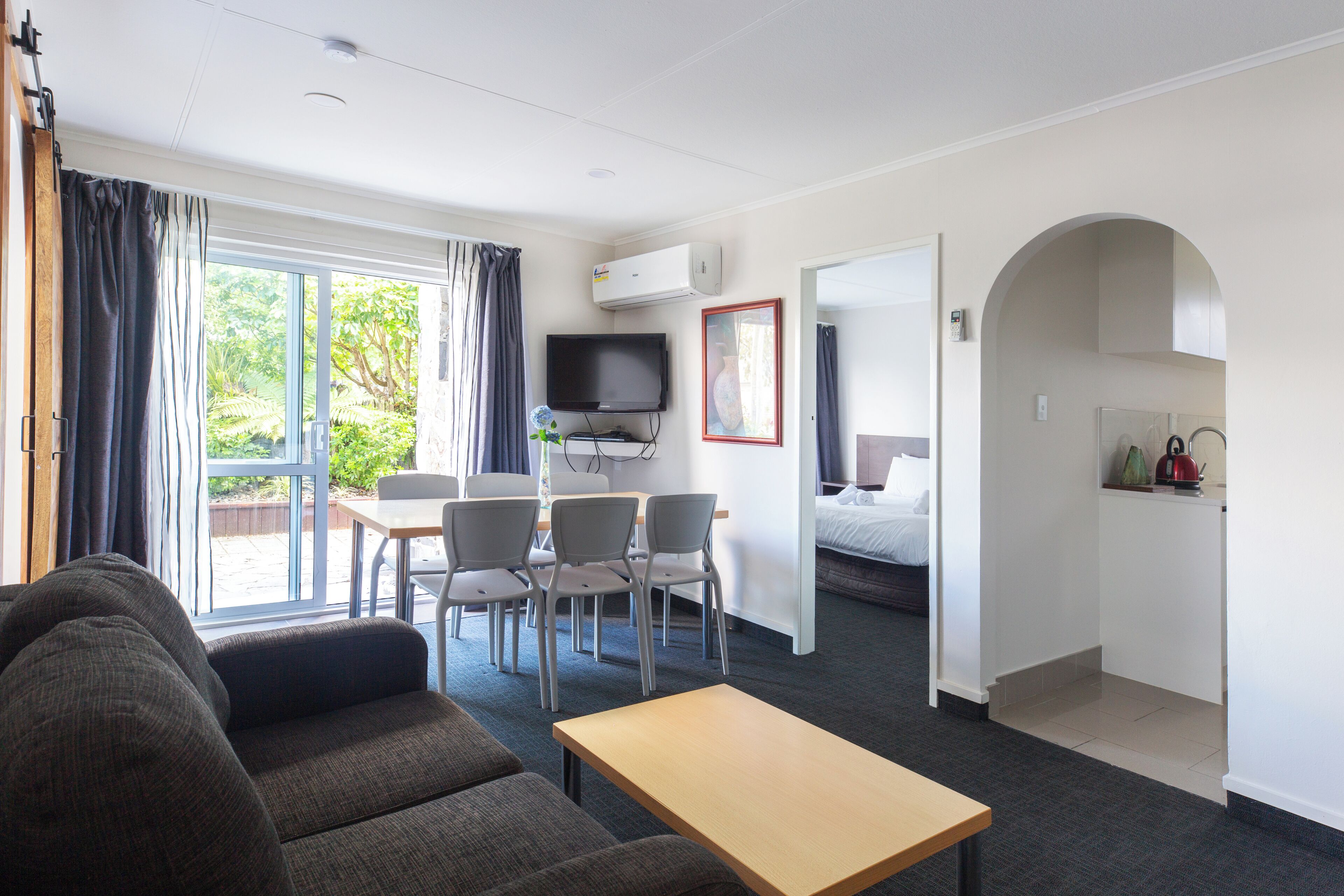 Premium Apartment | Living area | 32-inch flat-screen TV with satellite channels, TV, toys