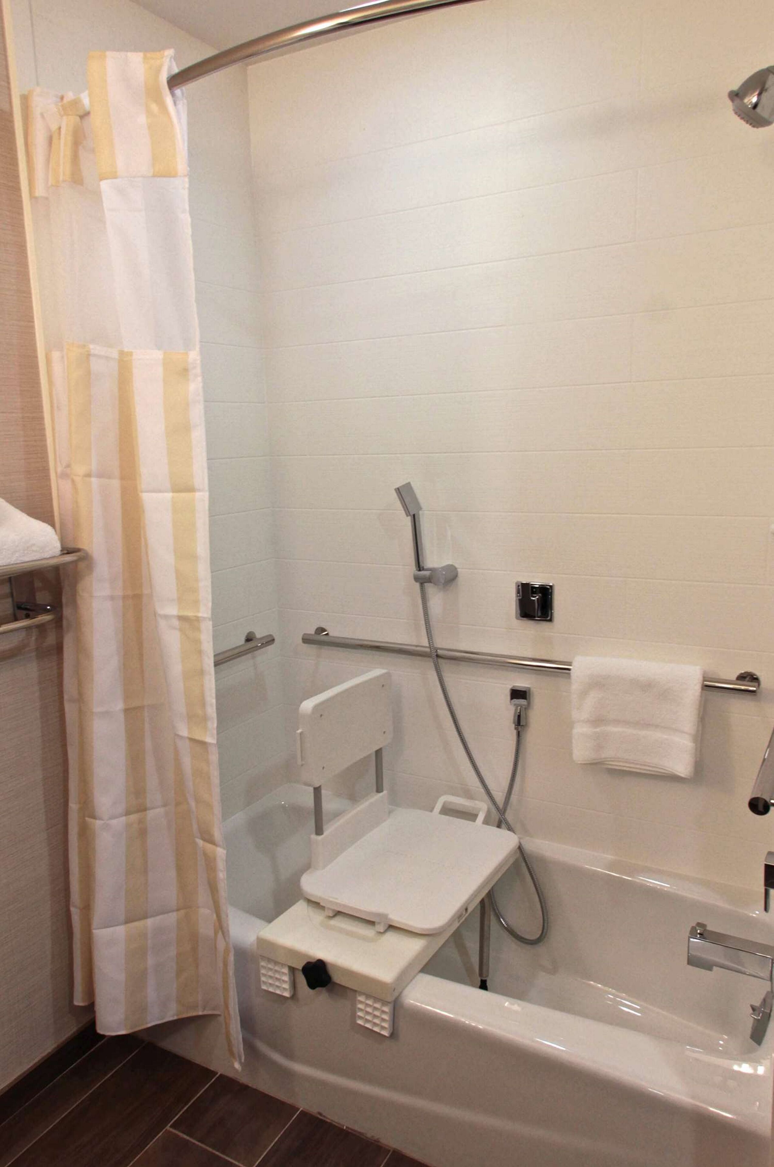 combined shower/bathtub, free toiletries, hair dryer, towels