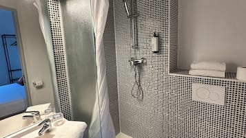 Renovated Double Room | Bathroom | Shower, hair dryer, towels