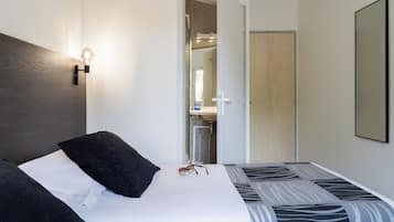 Renovated Twin Room | Desk, blackout drapes, iron/ironing board, free WiFi