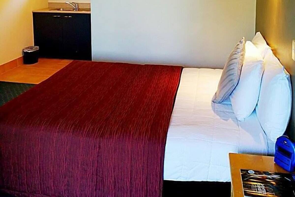 King Studio | Select Comfort beds, desk, blackout drapes, iron/ironing board