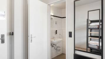 Shower, eco-friendly toiletries, hair dryer, soap