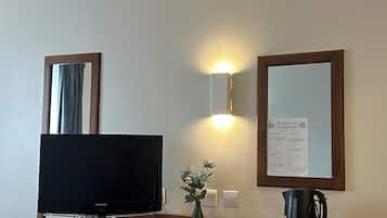 Desk, laptop workspace, blackout curtains, iron/ironing board