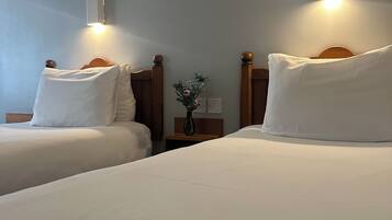 Twin Room, Non Smoking | Desk, laptop workspace, blackout curtains, iron/ironing board